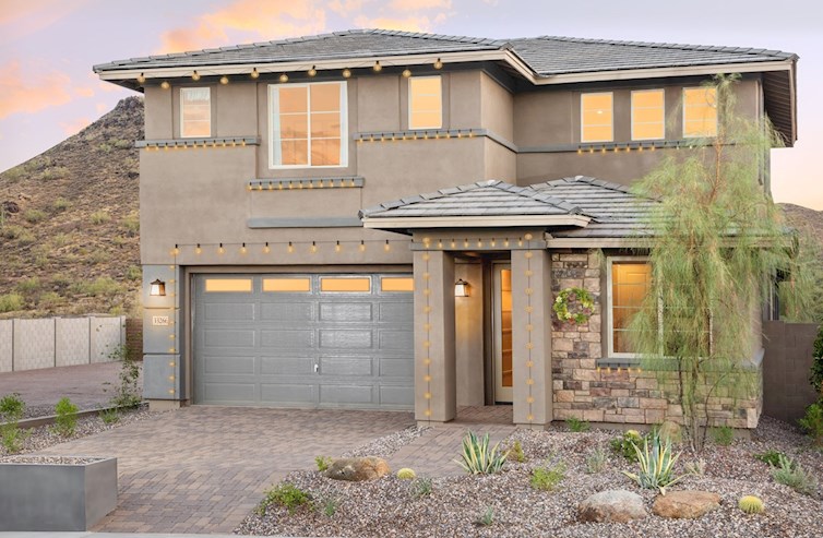 two-story home with Christmas décor 