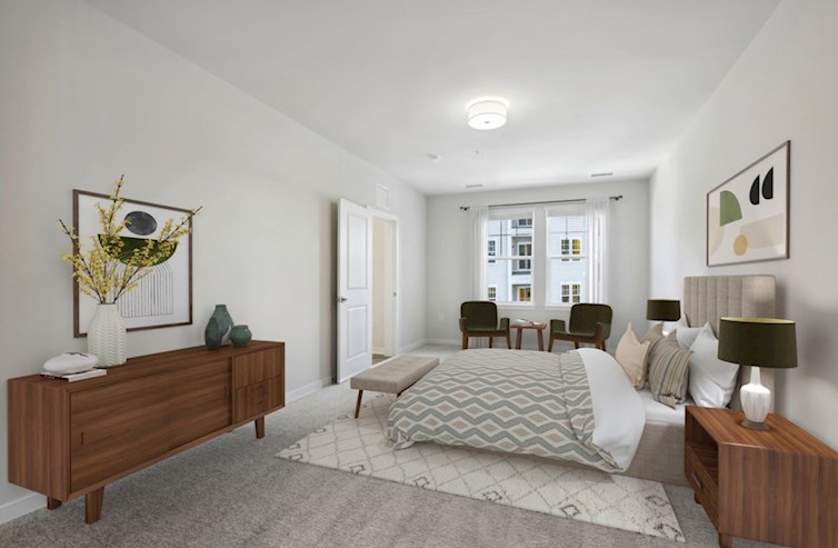 Aspen primary bedroom with double windows and tray ceiling