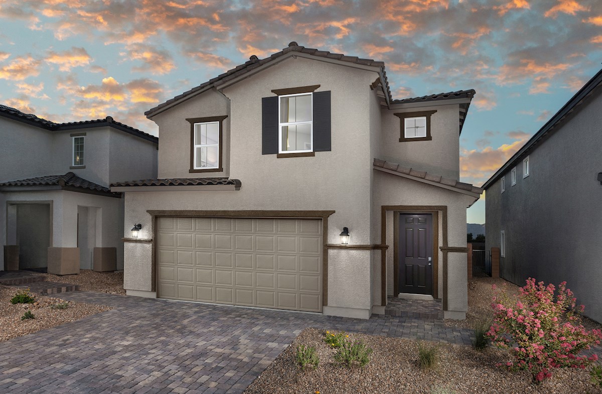 Two-story Mesquite home with driveway pavers