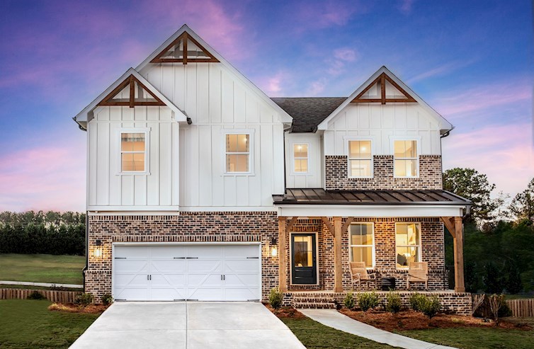 front of home with brick and wood details 