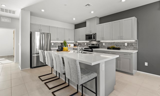 kitchen with 4 chairs and white cabinets with white countertop For more information on this video, review content in slideshow, overview, and details & features section