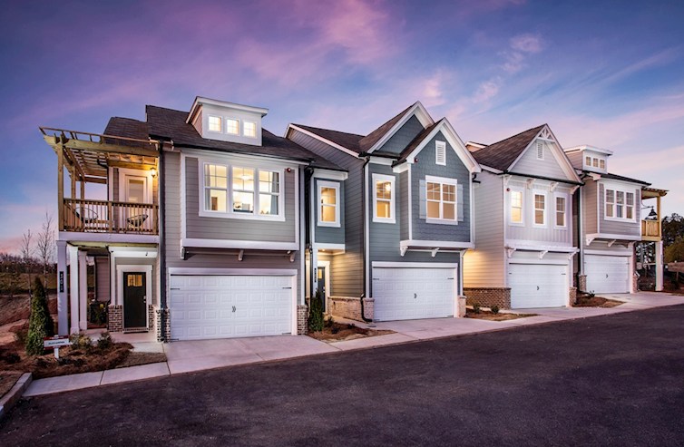 Two-story townhomes with front-load 2-car garages