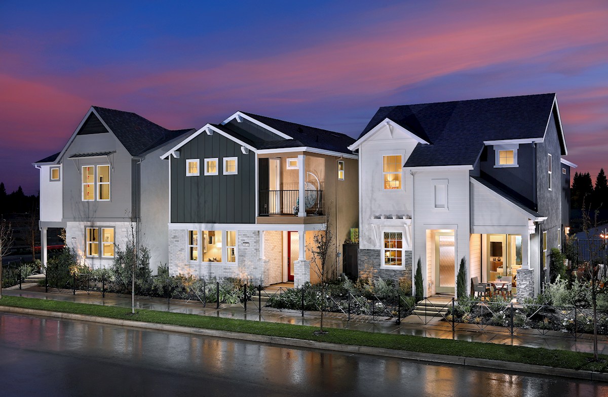 windrow model homes front exteriors at dusk
