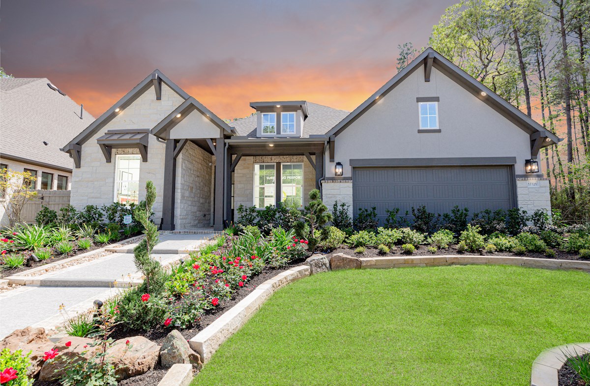 home front elevation with stone and stucco