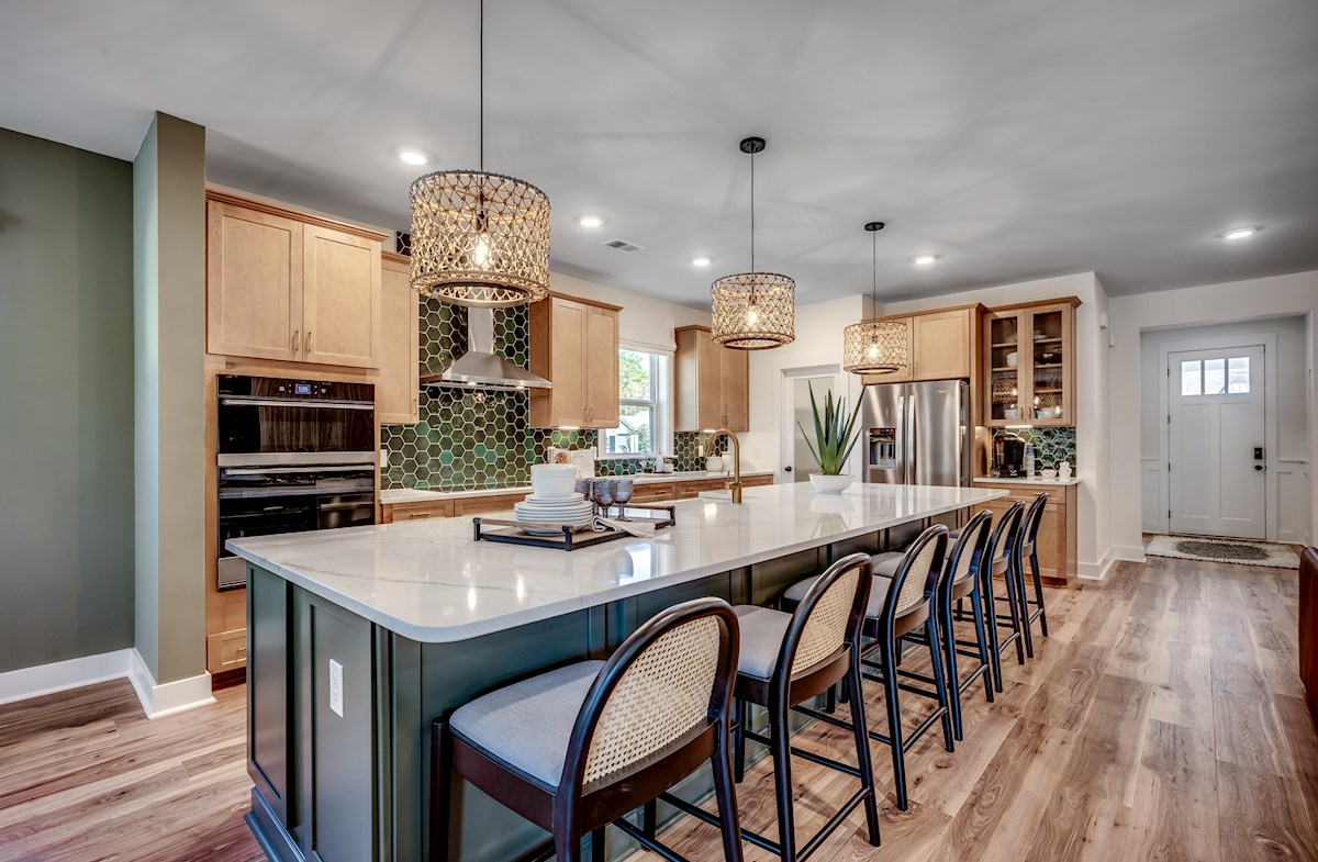 large island with brown cabinets