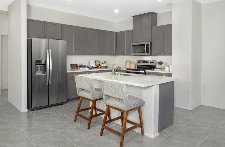 Bedford kitchen with grey cabinets and stainless steel appliances