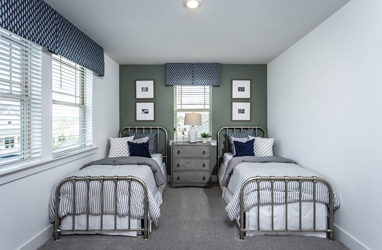 Wiltshire secondary bedroom with natural light and neutral carpet