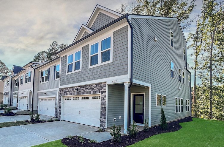 townhome building with stone accents