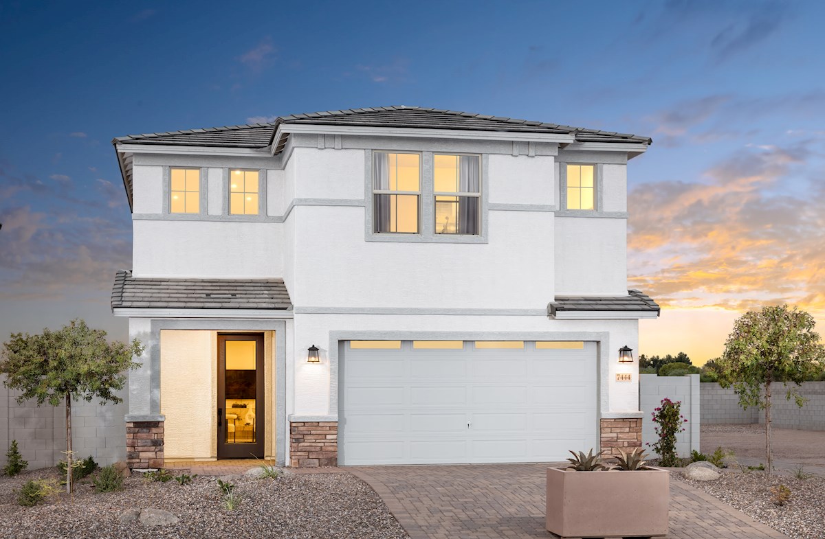 two-story home with desert landscaping