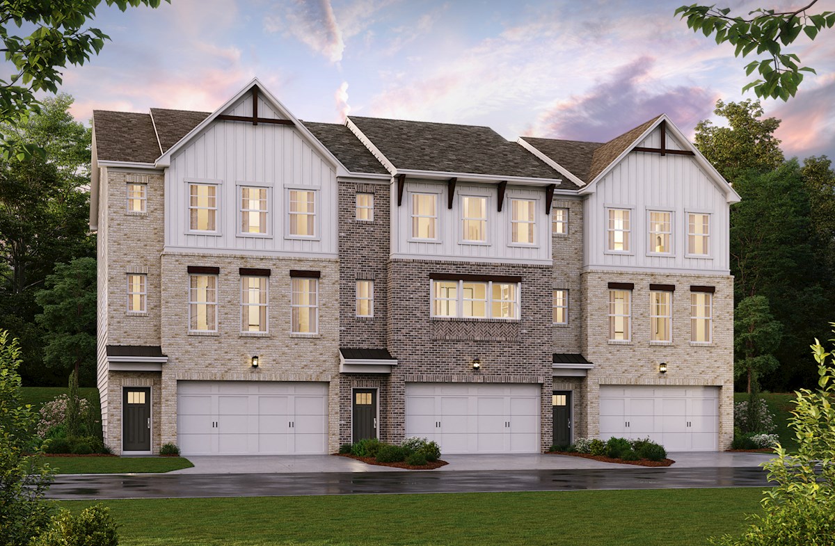 three-story townhomes with brick front exterior