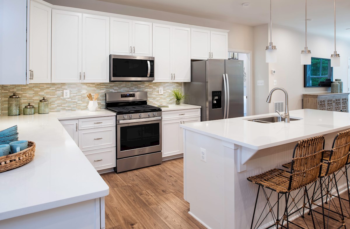 new kitchen in white with granite countertops