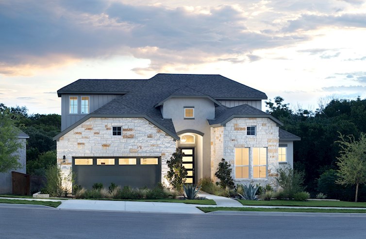 stone & stucco exterior with large windows