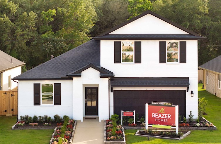 exterior with white brick & a black roof