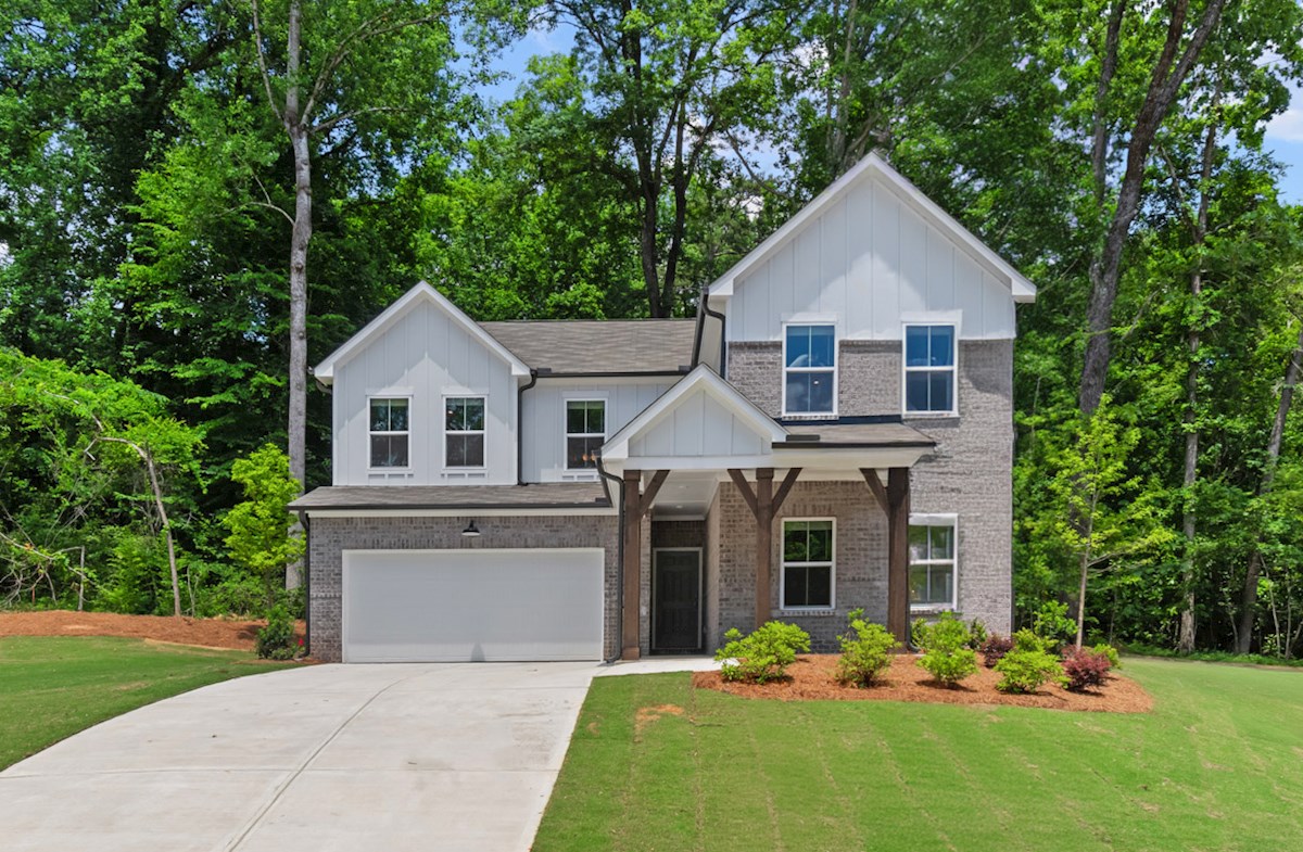 front of home with brick and wood details 