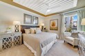 Aspen primary bedroom with double windows and tray ceiling