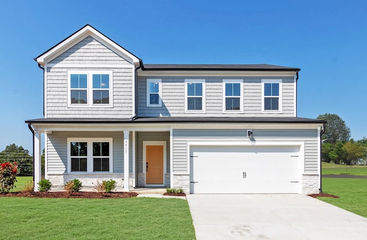 two-story single-family home with vinyl siding