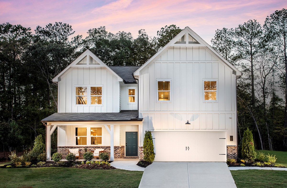 front of home with brick and white siding