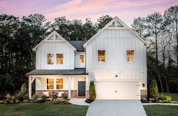 front of home with brick and white siding