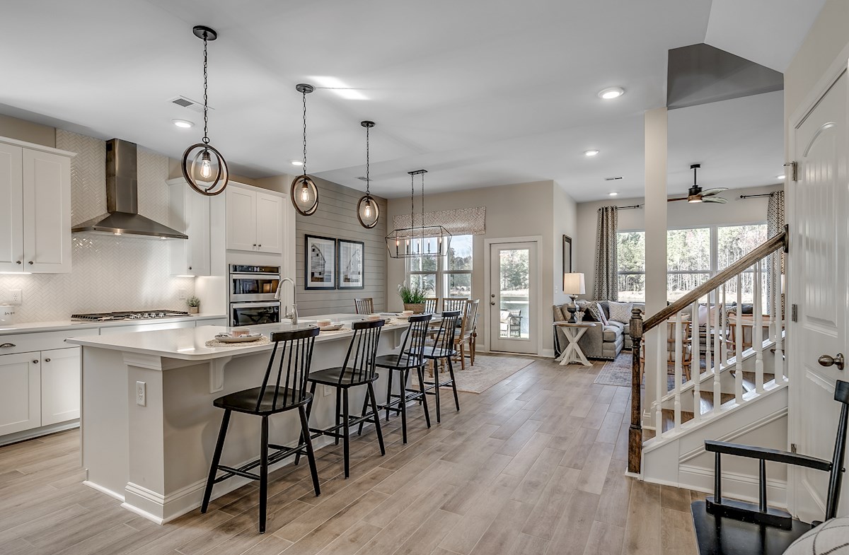 open-concept kitchen connects to the great room