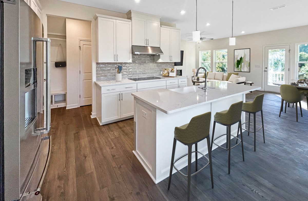 kitchen with white cabinets and large island