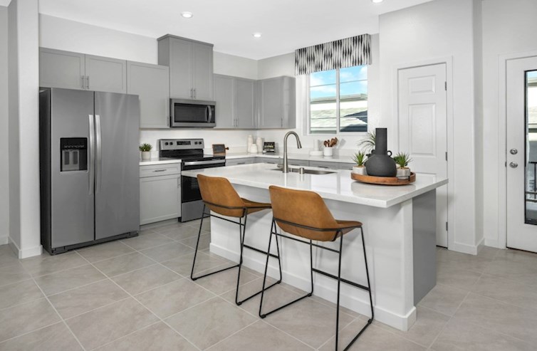 Griffin bright and open kitchen with gray cabinets and window