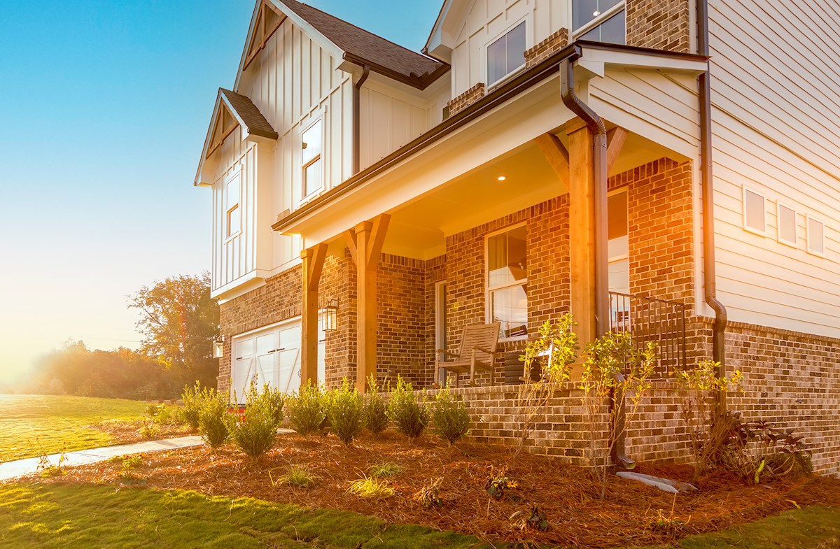 front of home with brick detail and front porch