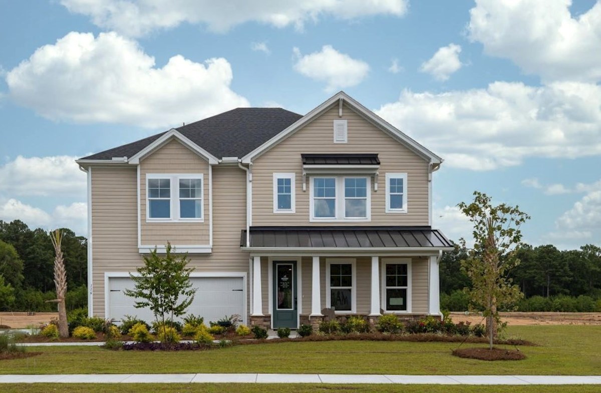 two-story home with metal roof accents