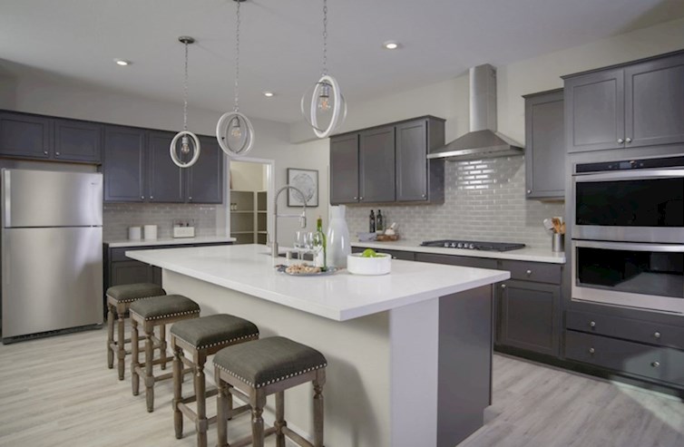 Somerset kitchen with gray cabinets and stainless steel appliances