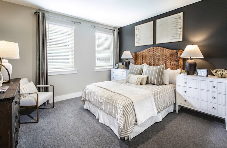 Clifton secondary bedroom with natural light and neutral carpet