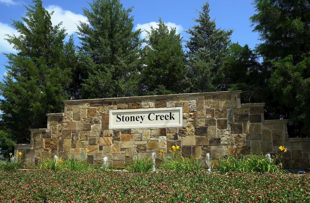 stone sign at community entrance