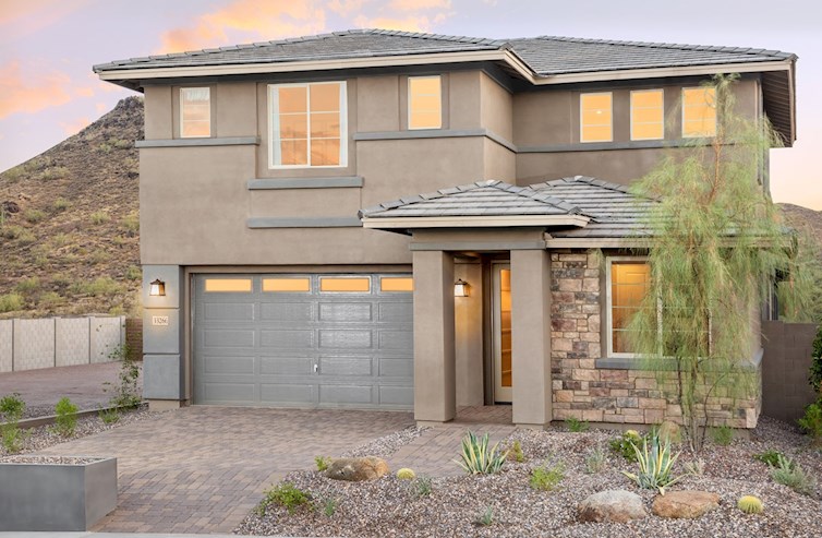 two-story home with desert landscaping