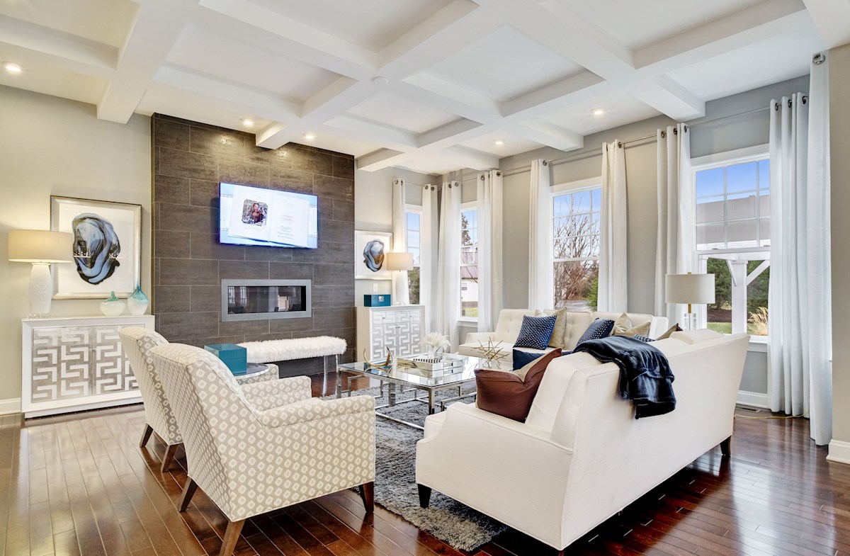 family room with coffered ceiling & fireplace