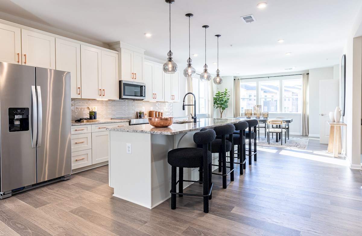 kitchen in white with copper hardware