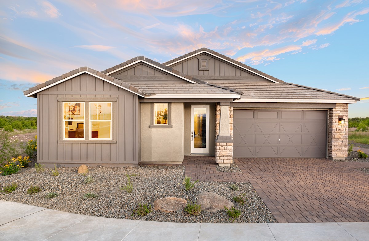 outdoor view of home with desert landscape