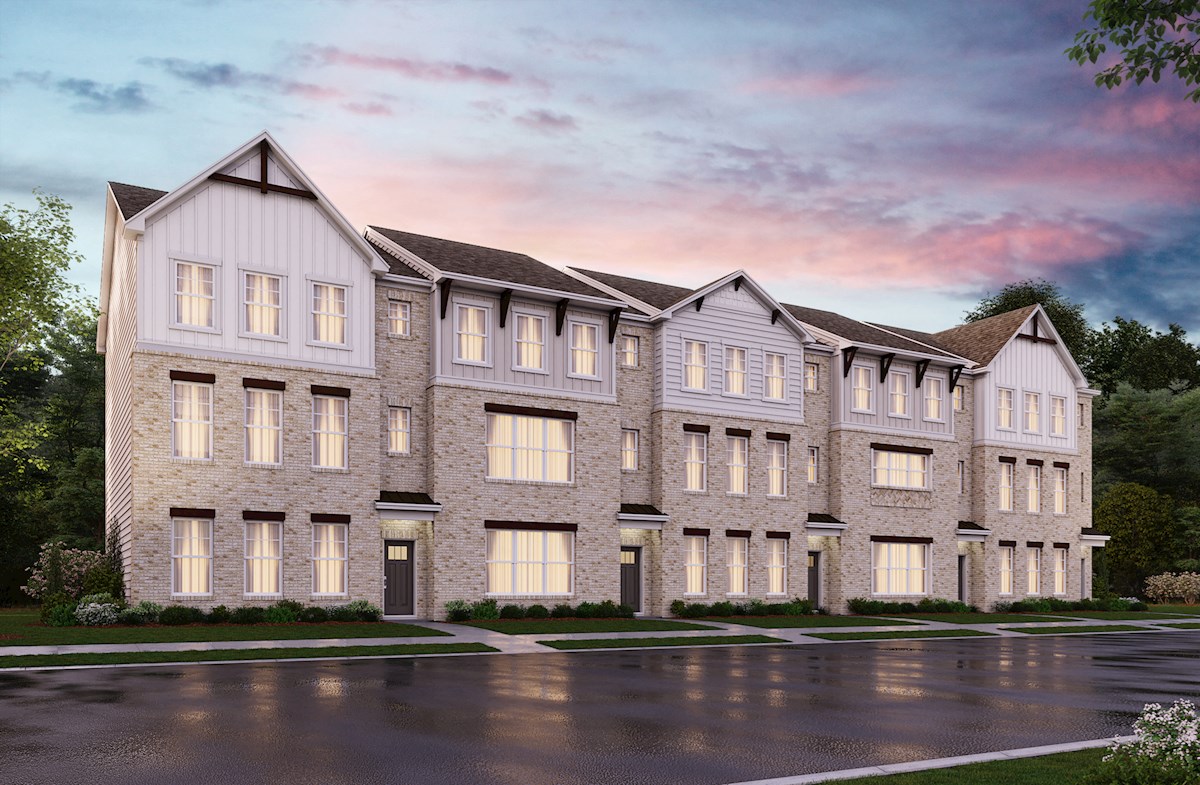 3-story townhomes with brick front exteriors